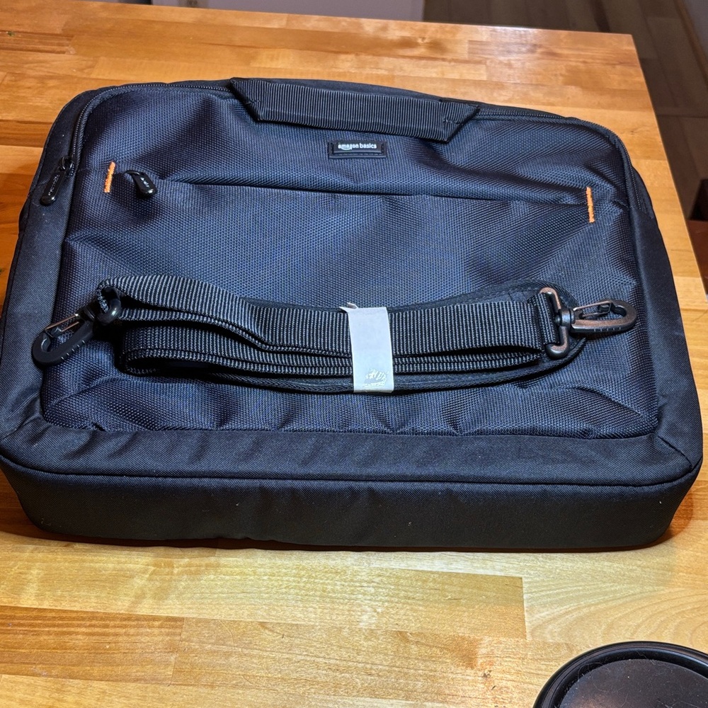 Elegant Black Laptop Bag with Orange Details